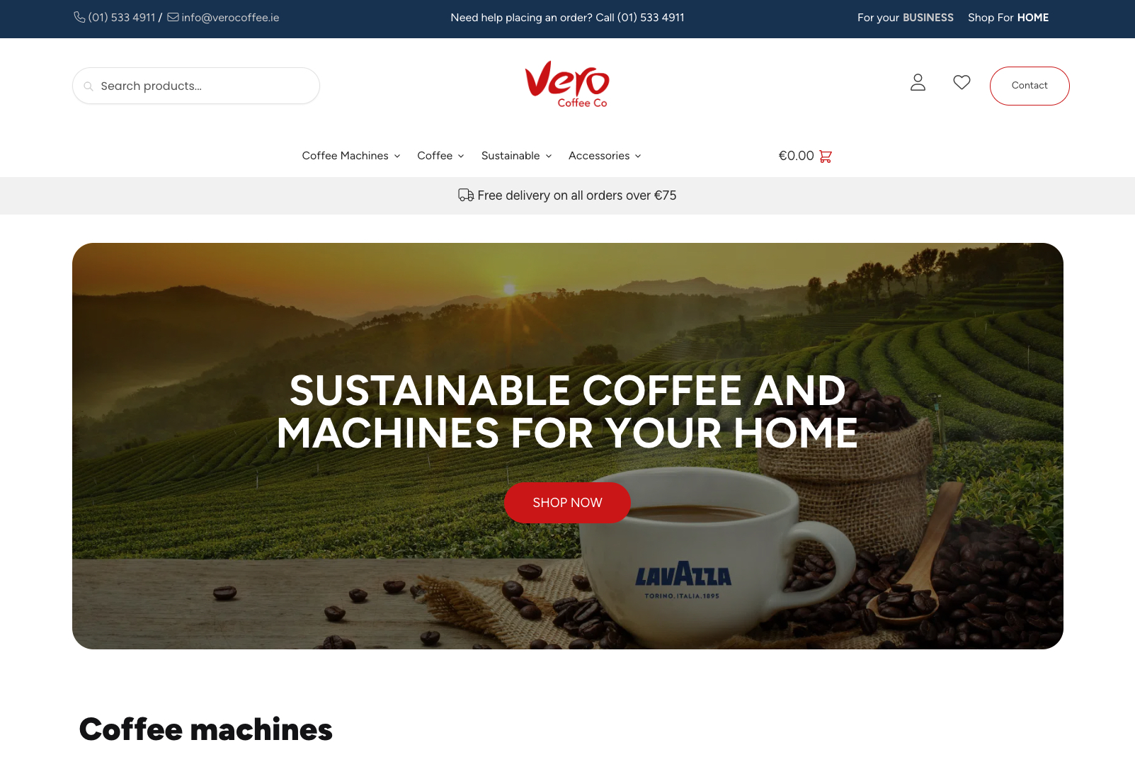 Screenshot of Vero Coffee Co's online store homepage. The top navigation includes contact info, a search bar, and menu links. A banner below features a scenic landscape with text: "Sustainable Coffee and Machines for your Home," and a Lavazza coffee cup.